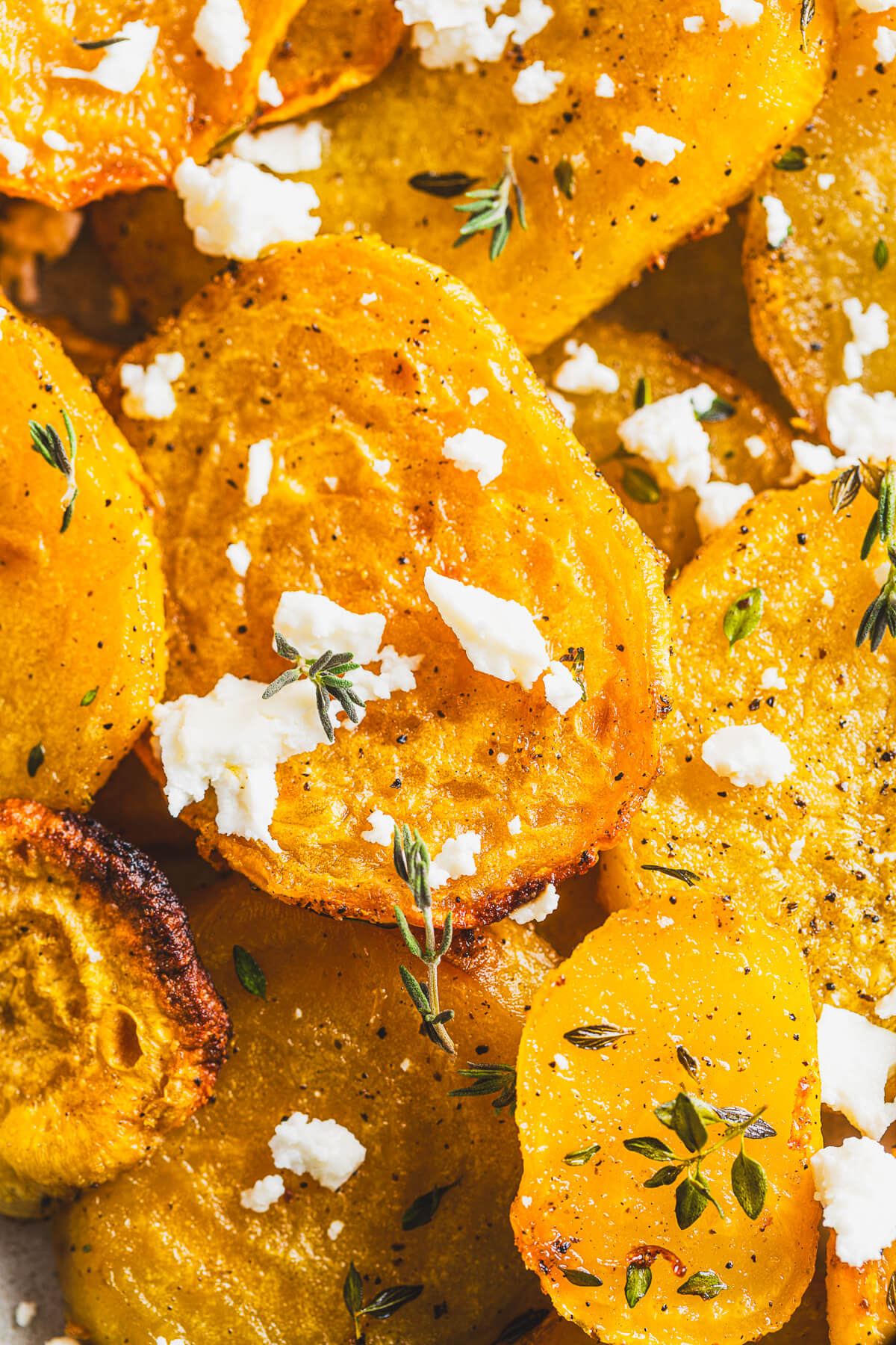 Close up of roasted golden beets showing caramelization.